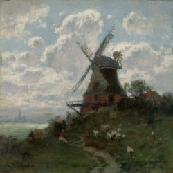 Windmill on cloudy day
